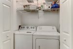 Full size washer and dryer off of the half bathroom